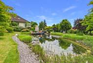 Werte für die Zukunft sichern: Großzügiges Einfamilienhaus mit Badeteich. Gartenparadies als sorgenfreies Investment.