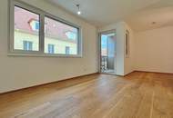 Erstbezug – 2-Zimmer-Charakter-Wohnung mit abtrennbarem Schlafbereich, Loggia, Luft-Wärmepumpe &amp; PV-Anlage