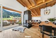Mit dem Lift direkt in Ihr neues exklusives Penthouse mit Glaskamin und Traum Ausblick in Aurach bei Kitzbühel -