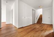 Meisterstück moderner Architektur: Penthouse mit 230m2 Terrasse & Wasserblick