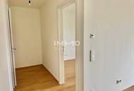 Von der Sonne geküsst: Provisionsfreier 2-Zimmer-Erstbezug mit 17 m² Balkon im 4. Stock