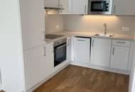 Moderne 2-Zimmer-Dachgeschosswohnung mit Komplettküche, Balkon und Kellerabteil / ALF52 3-15