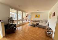 Lichtdurchflutetes Wohnjuwel mit verglaster Loggia in zentraler Lage von Götzens