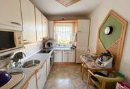 Geräumige Wohnung mit TG‑Platz &amp; unverbautem Balkonblick