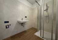3-Zimmer-Erstbezug mit 23m² Terrasse und kleinen Balkon – Top-Lage &amp; bezugsfertig!