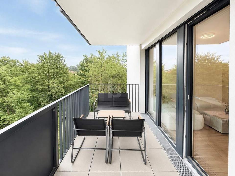 MODERNER WOHNTRAUM MIT GROßZÜGIGEM BALKON & BLICK INS GRÜNE