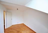 Charmante Dachgeschosswohnung mit Balkon und Lift in ausgezeichneter Lage