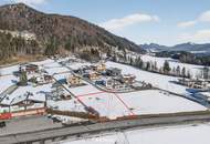 Sonniges Baugrundstück mit Bebauungsstudie für 6 Wohneinheiten in attraktiver Lage von Kössen