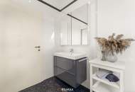 Wohnen über den Dächern von Graz mit Blick auf den Schlossberg: Exklusive Stadtwohnung mit Terrasse