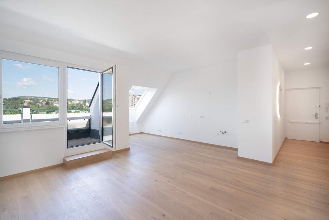 Frisch renovierte Dachgeschosswohnung mit Weitblick