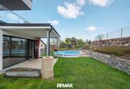 Barrierefreie Gartenwohnung mit DAN-Küche, Terrasse, Pool und zwei Parkplätzen in sonniger Ruhelage!