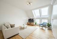 BEIM DONAUUFER: Erstbezug: Klimatisierte Dachgeschosswohnung mit ruhigem Hofbalkon