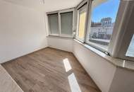 Großzügige 3 bis 4-Zimmer-Wohnung mit Kamin, sonniger Loggia und Stellplatz