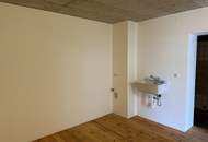 Klimatisierte Altbauwohnung mit großzügigem Wohnbereich, Tischlerküche und Terrasse in Maria Lanzendorf