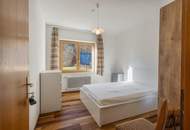 Kärntner Wohncharme in Seenähe – 5-Zimmer-Wohnung mit Kachelofen & Balkon