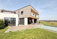 Architektenhaus in sonniger Ruhelage mit Spiral-Weinkeller, Infinity Pool und Burgblick
