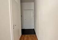 1,5-Zimmer Wohnung mit Gartenterrasse in generalsaniertem Neubau mit 11m2 Terrasse und einer tollen Raumhöhe!