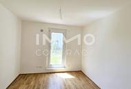 Südgarten in Ruhelage: Provisionsfreie 4-Zimmer-Wohnung, 2 Bädern, Eigengarten mit Grünblick