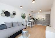 Exklusives Refugium mit Schwimmbiotop – Stilvoll möbliertes 2-Zimmer-Apartment in Ruhelage