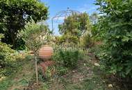 Charmantes Einfamilienhaus mit wunderschön angelegtem Garten