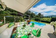 Beeindruckende Villa mit gepflegtem Garten und Pool als Investment