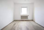 Renovierte-3-Raum-Eigentumswohnung mit Balkon und 203 m² Eigengarten