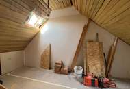 Traumhafte 4-Zimmer Wohnung mit Garten und ausbaubarem Dachgeschoss