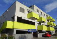 Neubauwohnung in Zentrumslage mit großer Balkon-Loggia und Carport