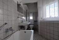 2.-3.Zi.-Wohnung mit Privatgarten, Garage, Holzlager und PKW Abstellplatz