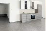 3,5% Rendite - gut vermietete Erdgeschoss-Wohnung nahe Fußgängerzone und Landesklinikum