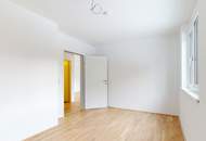 Erstbezug: 2-Zimmerwohnung mit Garagenplatz und Bergblick!