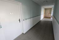 Kleine 2 Zimmerwohnung mit großem Westbalkon und Einbauküche!