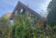 stark renovierungsbedürftiges Fertigteilhaus mit Vollkeller, und wunderschönem Garten