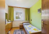 Wohnqualität und Raumvielfalt – gepflegtes Zweifamilienhaus mit Gartenidylle