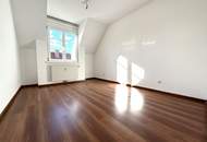 Ruhige 2-Zimmer Wohnung mit Grünblick, Terrasse + 2 Garagenplätzen