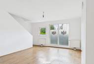 Modernes Reihenhaus mit kleinem Garten, 2 Garagenplätzen und übernehmbarer Wohnbauförderung