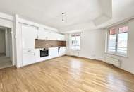 DG-Traum | 2-Zimmer-Wohnung + moderne Küche & Tageslichtbadezimmer – in stilvoll saniertem Altbau