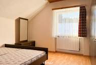 Ein Zuhause voller Möglichkeiten: Einfamilienhaus mit Nebengebäude und Doppelgarage - bereit für Ihre Ideen