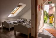 Großes Wohnhaus mit Heurigenlokal / 5 Gästezimmern und einem Miethaus