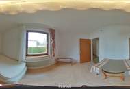 Vorne Garten. Hinten Grün. Innen viel Licht und Wohnqualität.