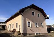 Wohnhaus mit 2 Einheiten, großer 2-stöckiger Garage und gemütlichem Garten