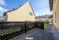 Gepflegtes Einfamilienhaus mit 2 Wohneinheiten, Garten/Terrasse &amp; 3 Garagen in sonnige Ruhelage!