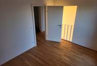 Exklusiver Neubau im 10. Stock mit Seeblick, Kochinsel & großzügigem Balkon – moderne 3-Zimmer-Wohnung