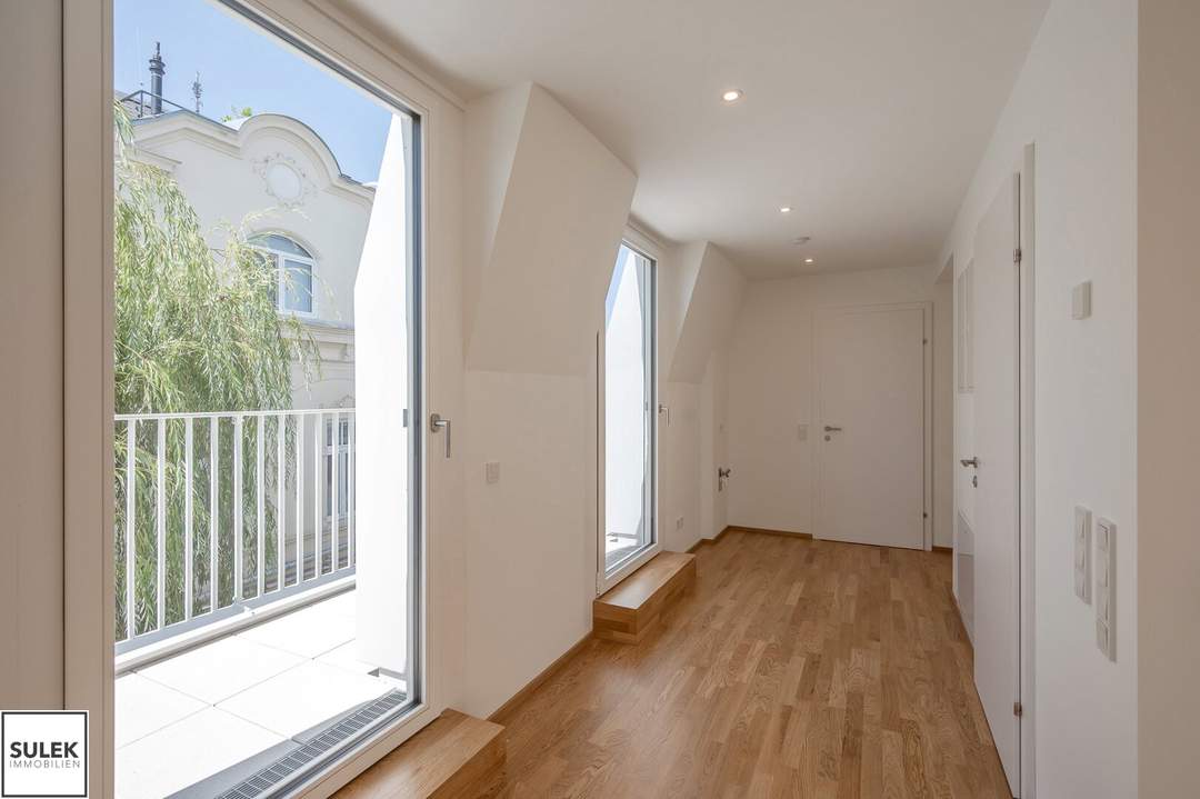 Klimatisierte Dachgeschosswohnung mit Büroraum & 16 m² Balkon | VILLMA – Top 6