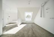 Erstbezug! Elegante 3-Zimmer Dachgeschosswohnung mit Balkon