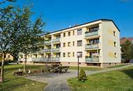 Wohnen mit Burgblick – Mietwohnung mit Südloggia in Pitten - Sautern