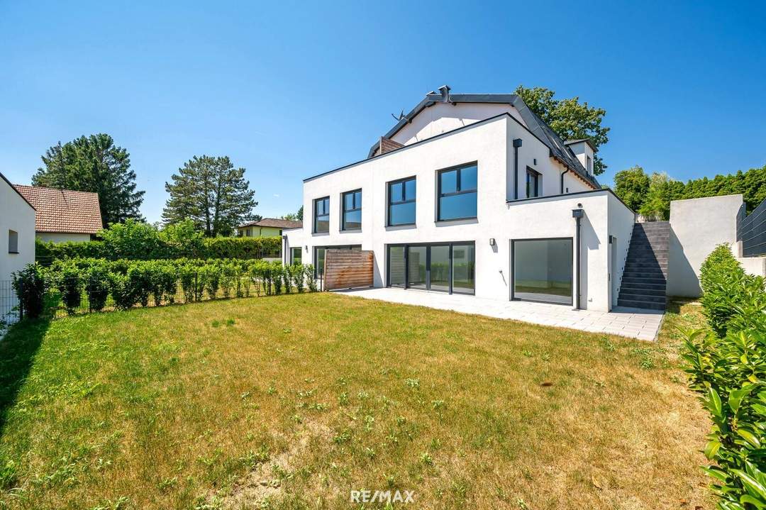 Erstbezug: Großzügiger Familientraum mit unverbaubarem Grünblick!