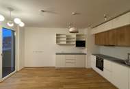 Wohnen im Bel Atrium: Zwei Zimmer Neubau Wohnung mit Balkon, inkl. Stellplatz und vielen Extras