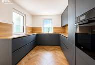 Haus-im-Haus-Gefühl: Exklusive 5 Zimmer-Maisonette mit Garten, hochwertiger Küche, tischler Einbaumöbeln und 3 Stellplätzen – provisionsfrei