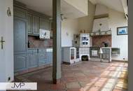 Großzügige DG Wohnung mit 2 ruhigen Südterrassen in zentraler Lage